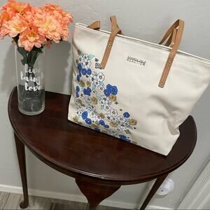 Kenneth Cole Reaction cream tote with blue and yellow flowers